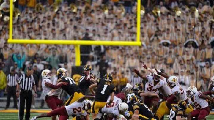 FILE - Iowa place kicker Aaron Blom (1) misses a field goal at the end of an NCAA college football game against Iowa State, Saturday, Sept. 10, 2022, in Iowa City, Iowa. Iowa State won 10-7. A former walk-on kicker at the University of Iowa was charged Wednesday, Aug. 2, 2023, in connection with wagering on Hawkeyes sports events — one day after Iowa State quarterback Hunter Dekkers was accused of committing the same offense. The criminal complaint filed in Johnson County said Aaron Blom, who was on the Iowa roster from 2020-22, tampered with records related to an Iowa Criminal Division investigation into sports gambling. (AP Photo/Charlie Neibergall, File)
